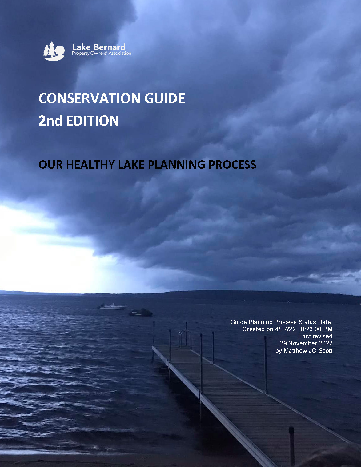 cover of the Lake Bernard Conservation Guide - Title and logo superimposed on a photo of a stormy Lake Bernard with a dock and two boats in the foreground